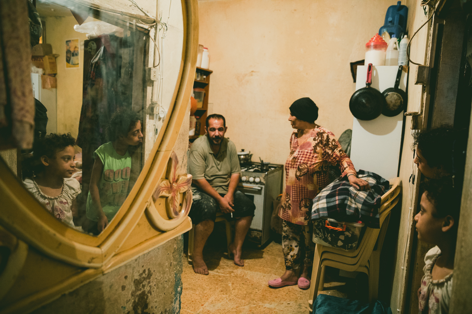  A family gathers in the kitchen of their small home in the Shatila refugee camp. 