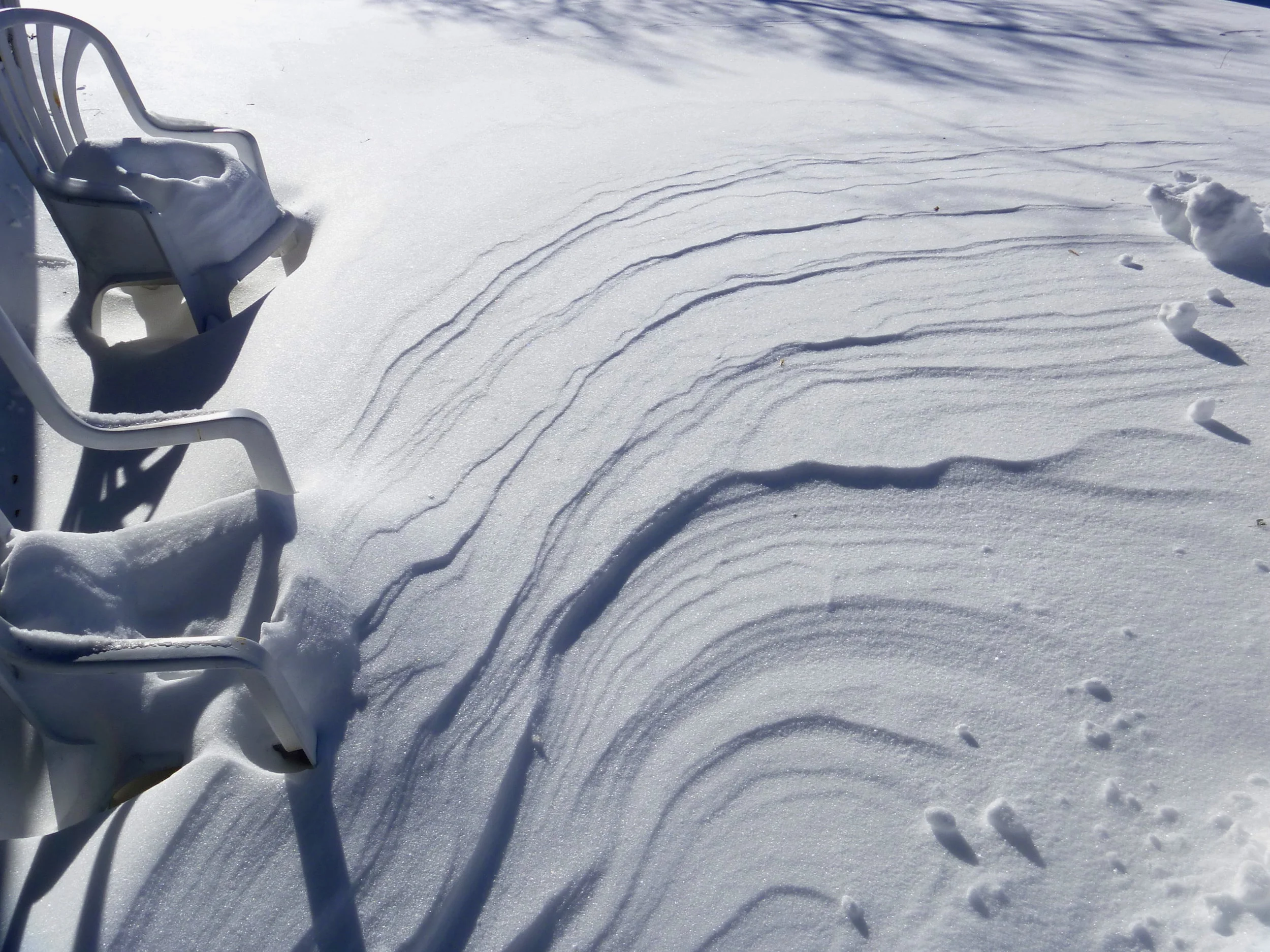 White Chairs In The Snow