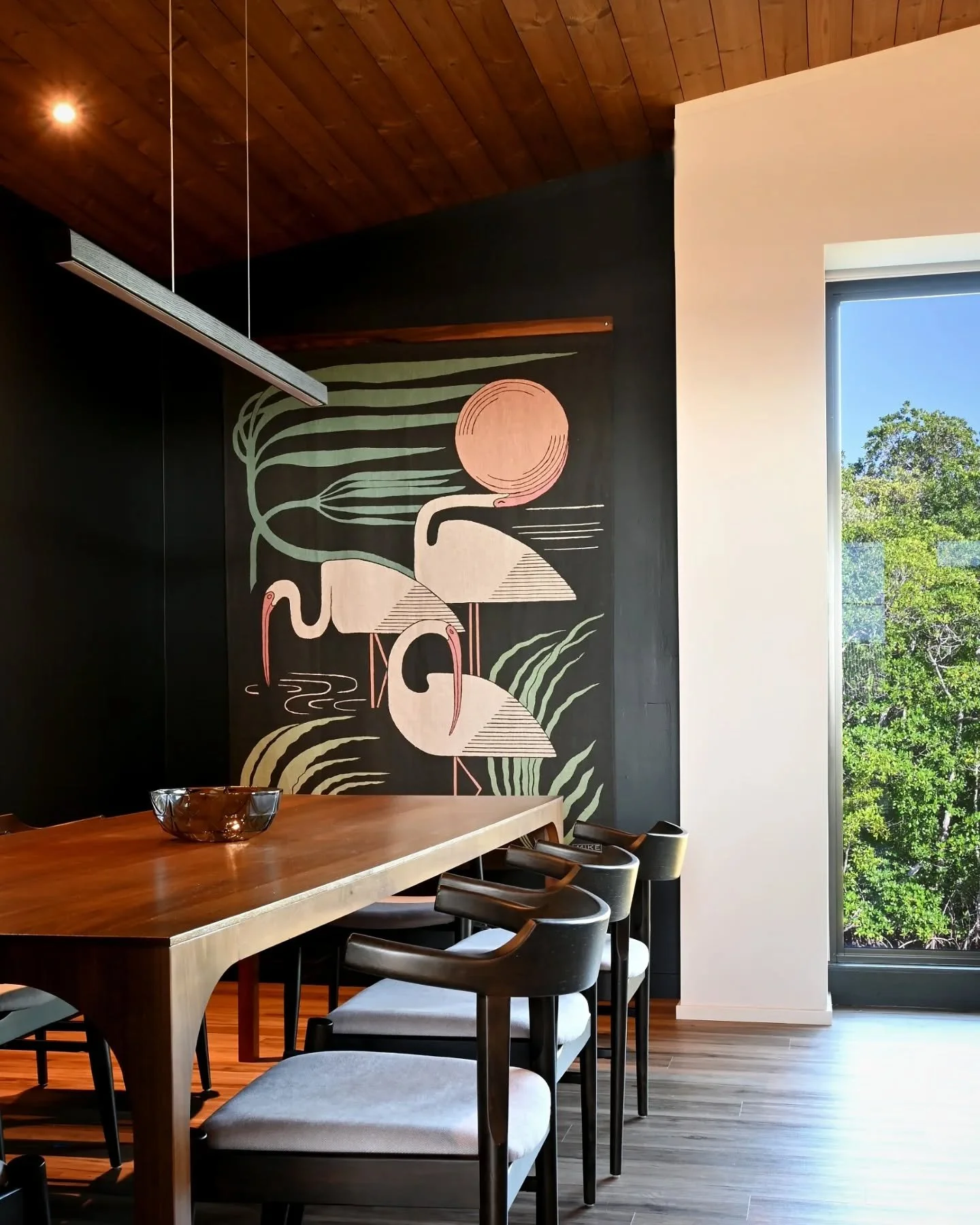This stunning tapestry by Mike Wilcox bookends the dining table at  #TheButtonwoodcottage , it beautifully captures Florida&rsquo;s essence showing ibis and palms bending to the force of a hurricane. Also featured: our custom map showcasing Florida's