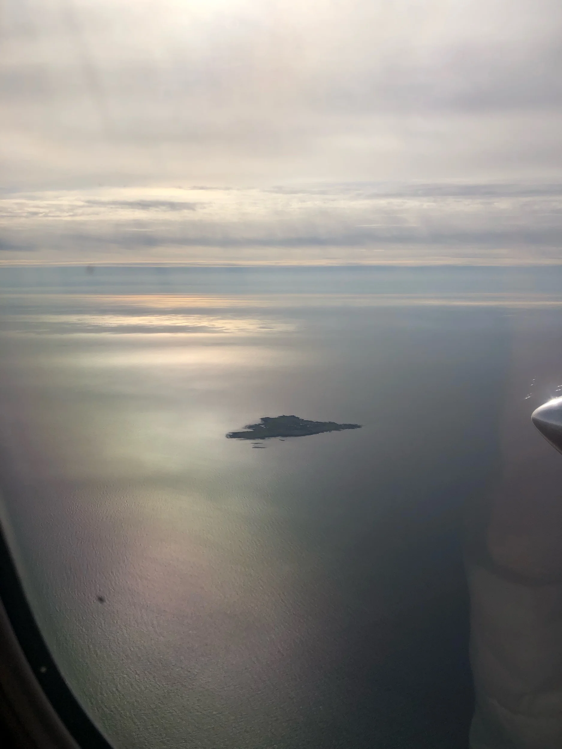 On the way to Orkney. We were in the front row. Only about a dozen people on the plane with us.