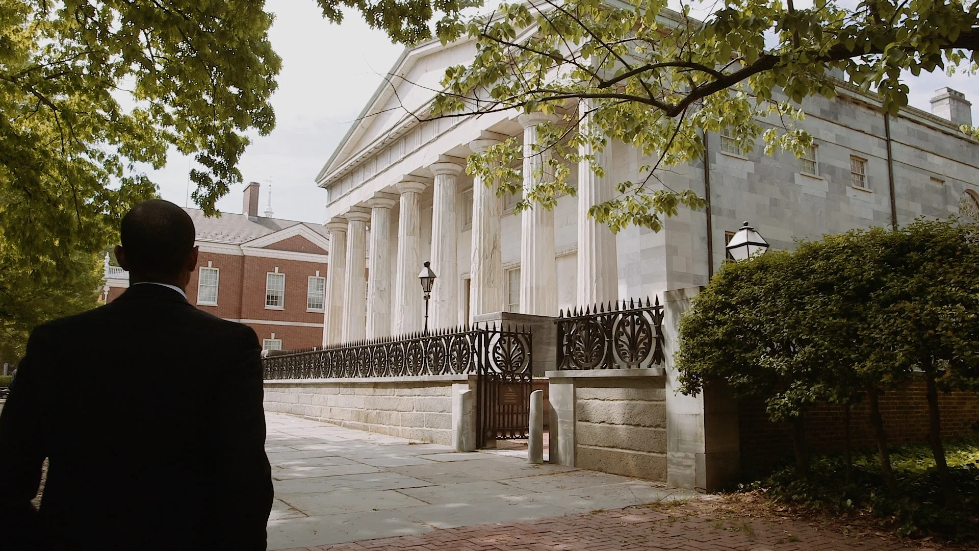 Groom walking to the Second Bank Philadelphia for First Look with Bride