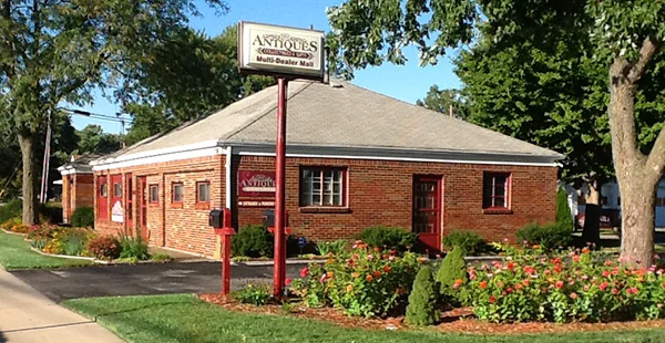 Look for HH Antiques in this mid-century brick building. Onsite parking is available beside the building.