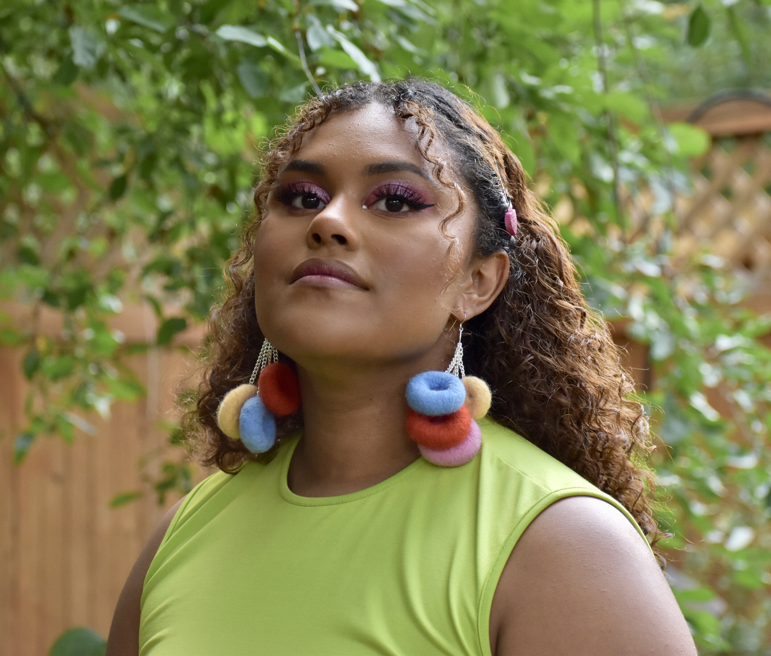 Destiny in the fruit loop dangle earrings. Taken with a Nikon 5600. August 2020.August 2020.