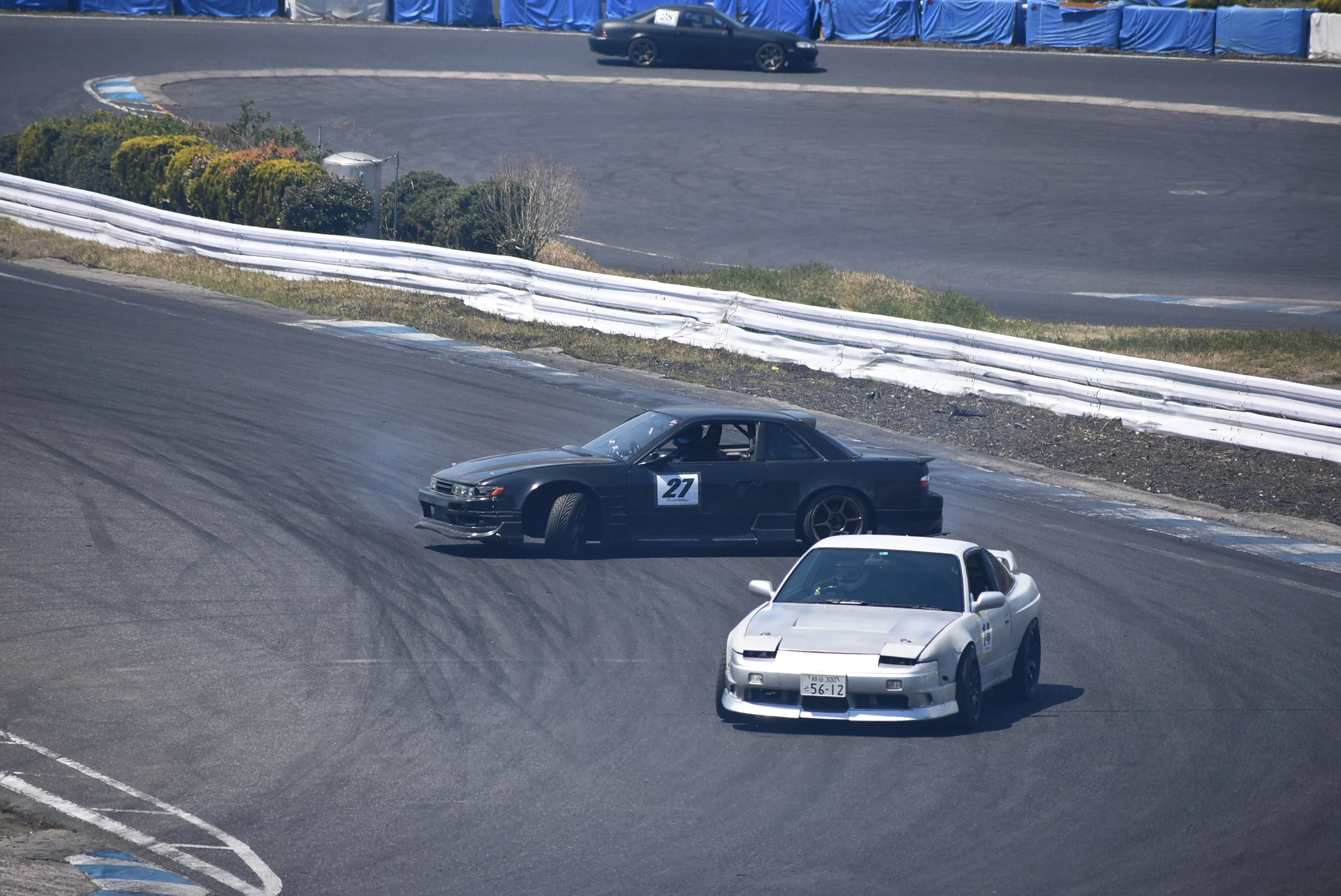 He was on a fast grip cool-down lap, and I knew I wouldn’t catch him, so I tossed it in behind him. Luckily Andy caught the picture. Grip vs Drift line; it’s pretty funny to see the difference.