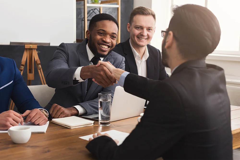 business-handshake-at-multiethnic-office-meeting.jpg
