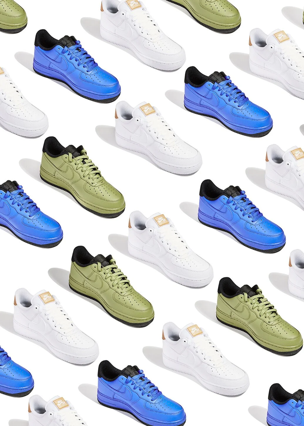 Pattern of colorful sneakers including white, blue, and green shoes arranged on a white background.