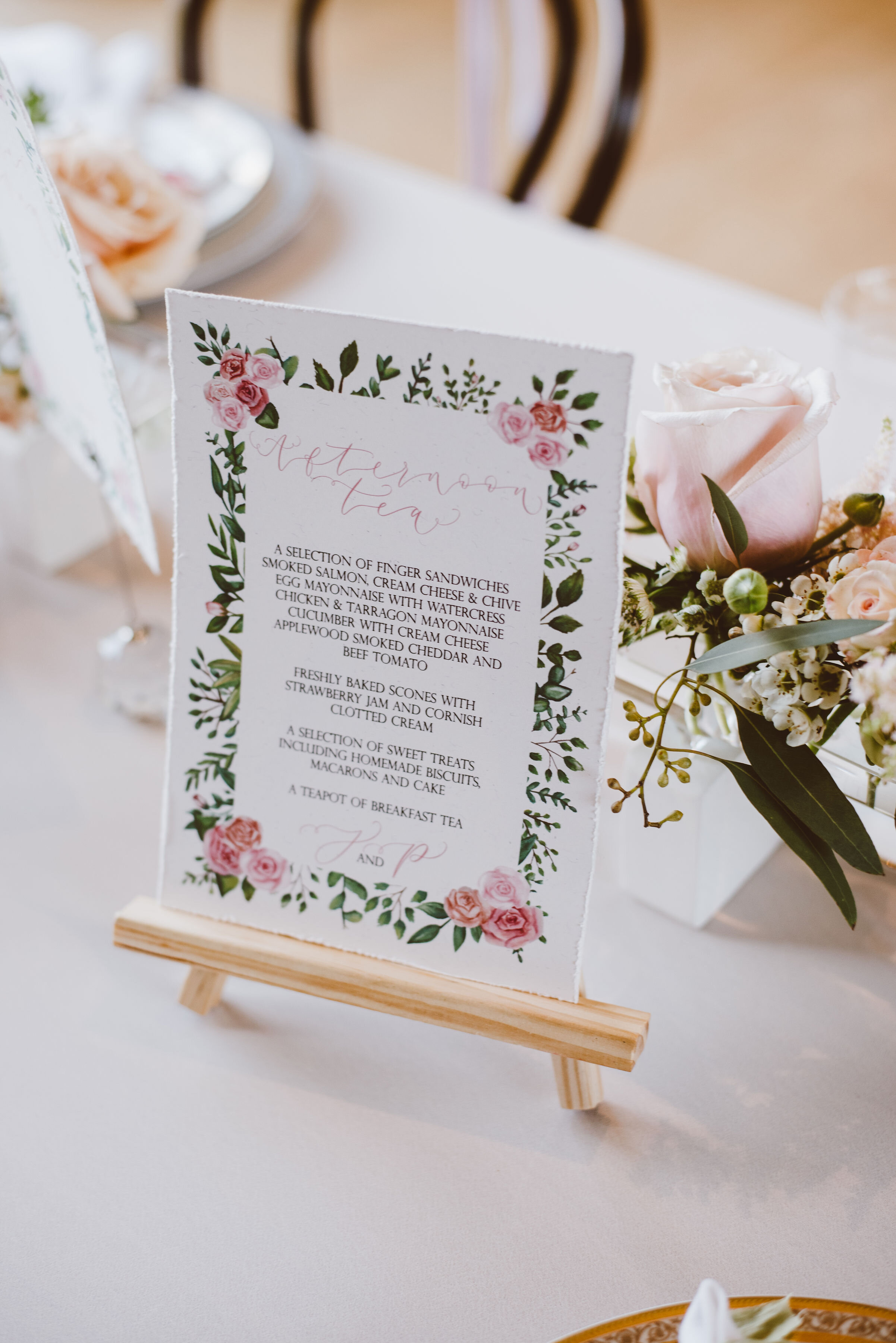 Afternoon tea wedding  - Luxury recycled paper floral wedding menu with pink roses and greenery and hand-lettered calligraphy by The Amyverse - Eco friendly wedding stationery