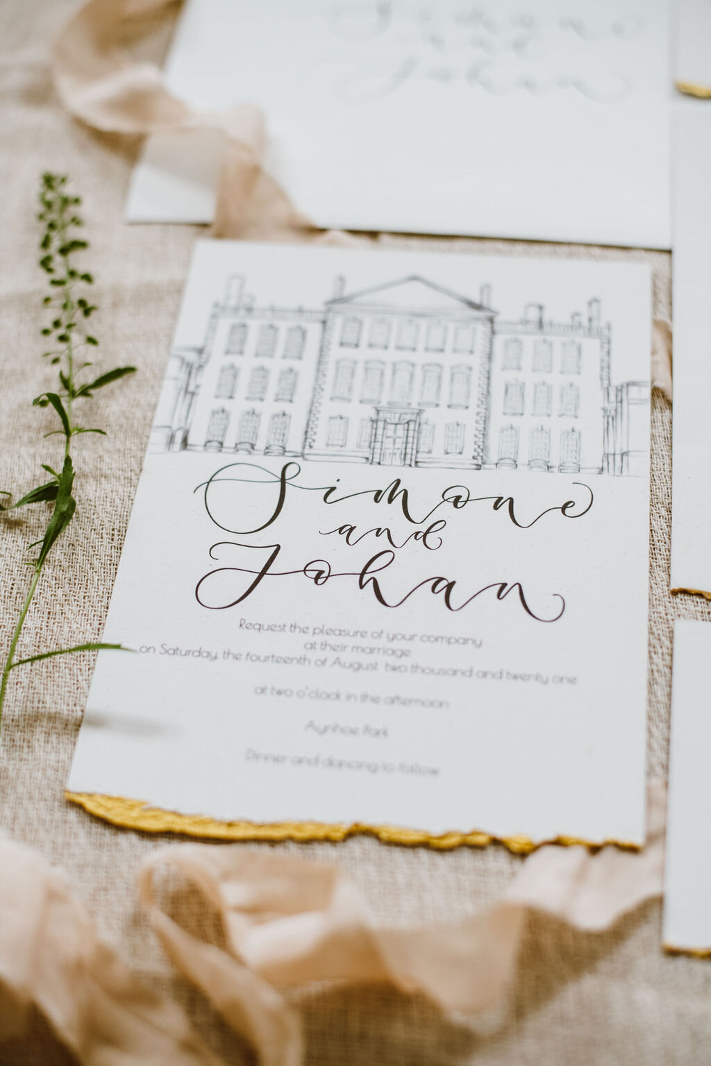 Monochrome Aynhoe Park invitation with venue illustration printed on recycled paper with gold details by The Amyverse.jpg