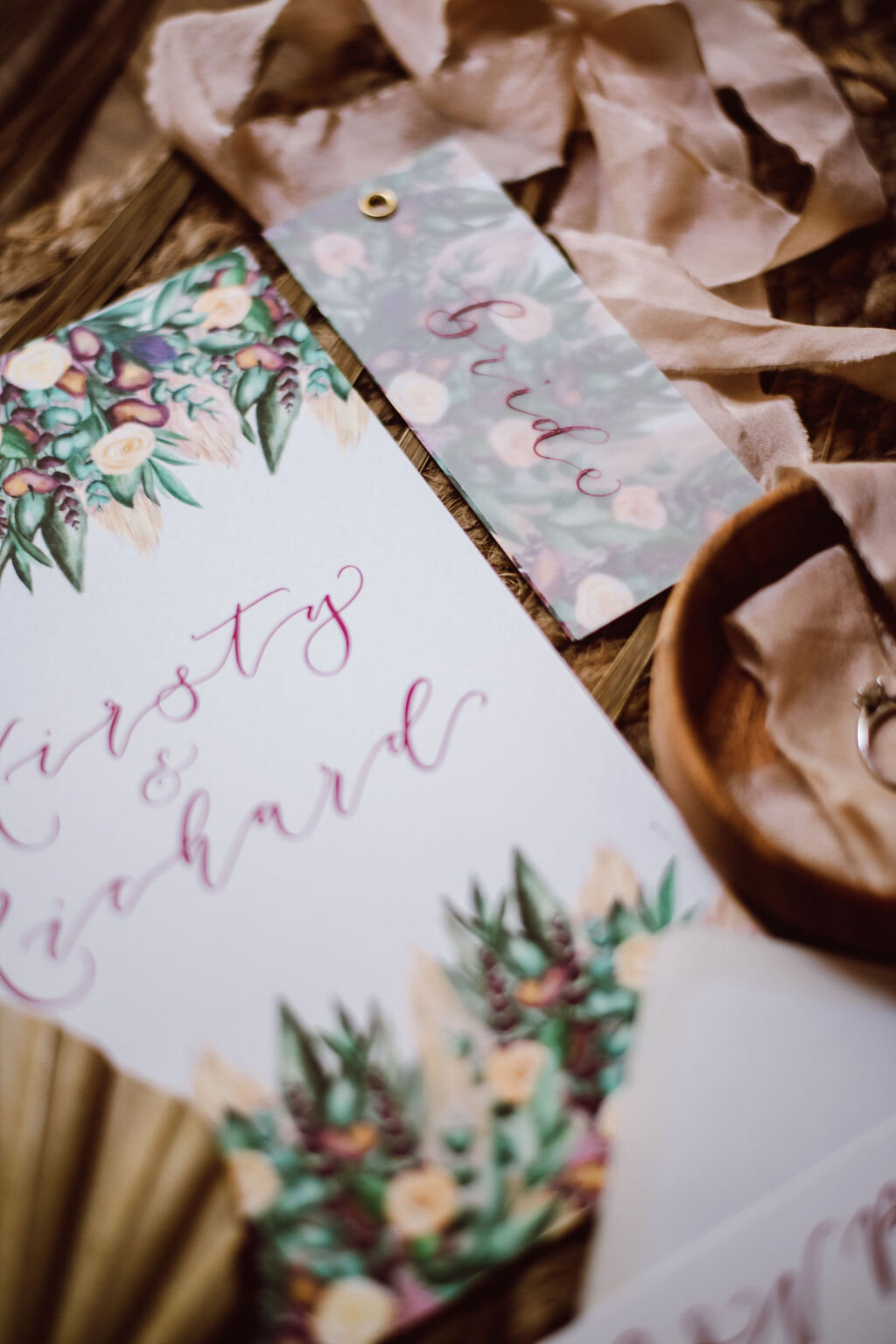 Burgundy calligraphy place cards  on vellum with watercolour painted pampass grass, roses, thistles - Bride.jpg