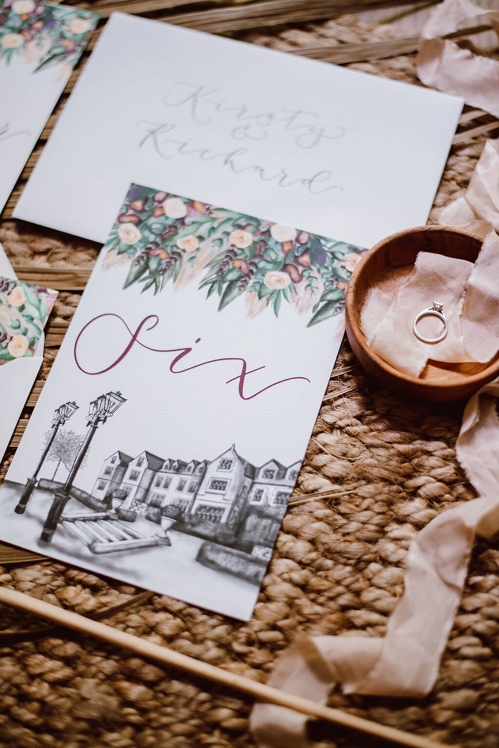 South Lodge hotel boho wedding Table number with venue illustration, calligraphy and painted florals, pampass grass, thistles and roses..jpg