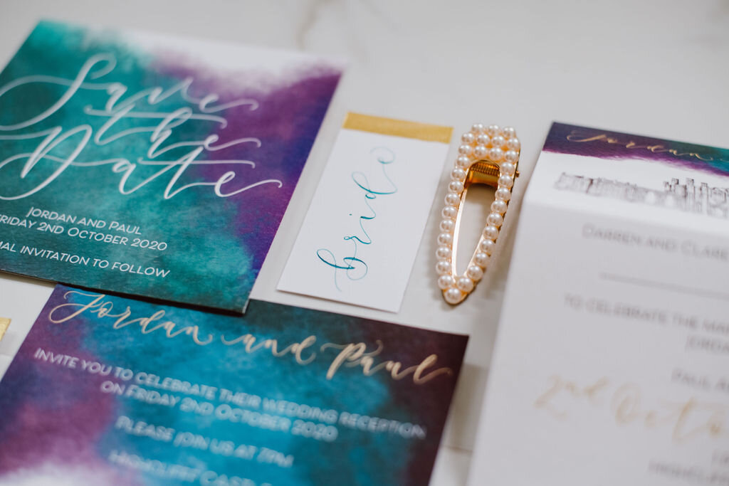 Teal calligraphy with gold detail place cards by the amyverse to match turquoise and purple stationery suite for Highcliff Castle -Bride.jpg