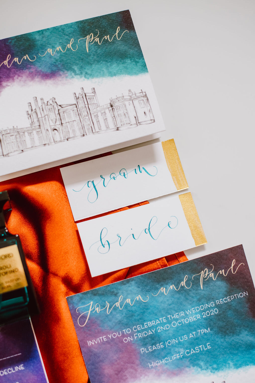 Teal calligraphy with gold detail place cards by the amyverse to match turquoise and purple stationery suite for Highcliff Castle.jpg