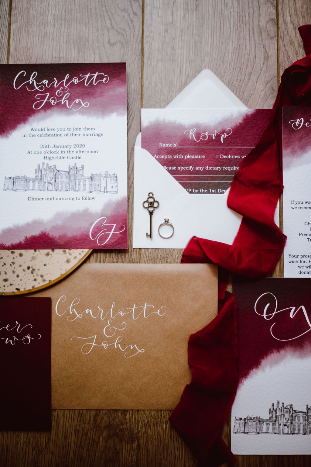 Burgundy watercolour and Highcliff castle illustration wedding wedding invitation suite with kraft paper calligraphy envelope.jpg