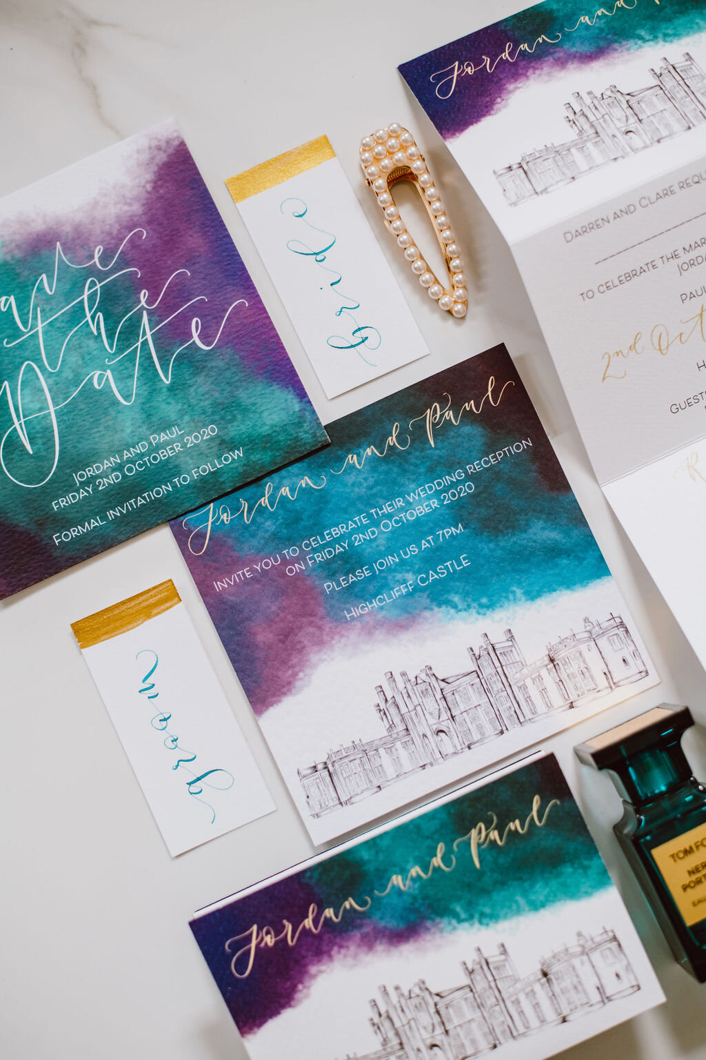 Highcliff castle teal, purple and gold watercolour concertina invitations with calligraphy and venue illustration with matching rsvp and save the date staionery suite.jpg