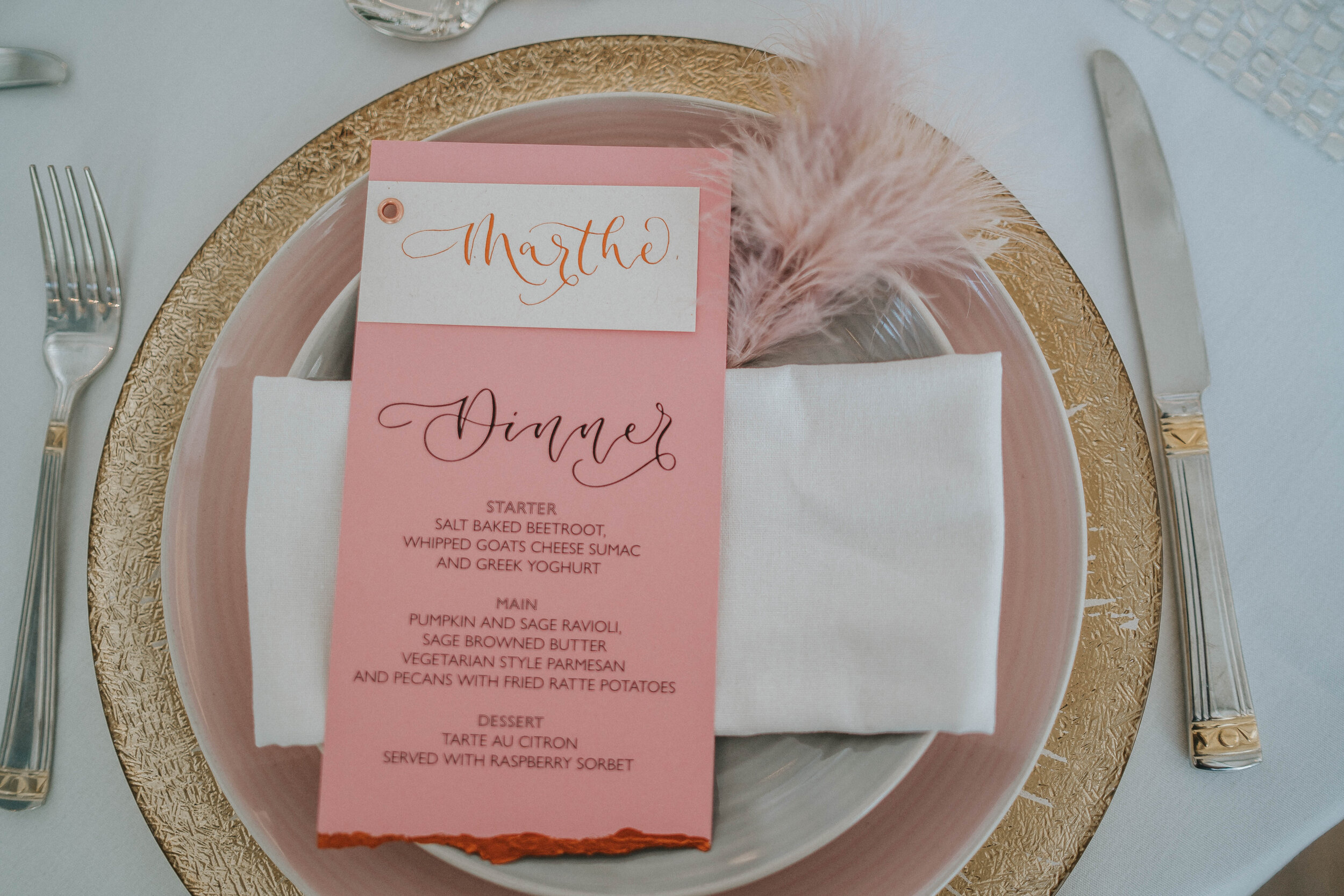 Pink and copper eco friendly wedding stationery created with blush pink recycled paper with modern calligraphy and deckled edge and menu combined with placecard with copper ink.jpg