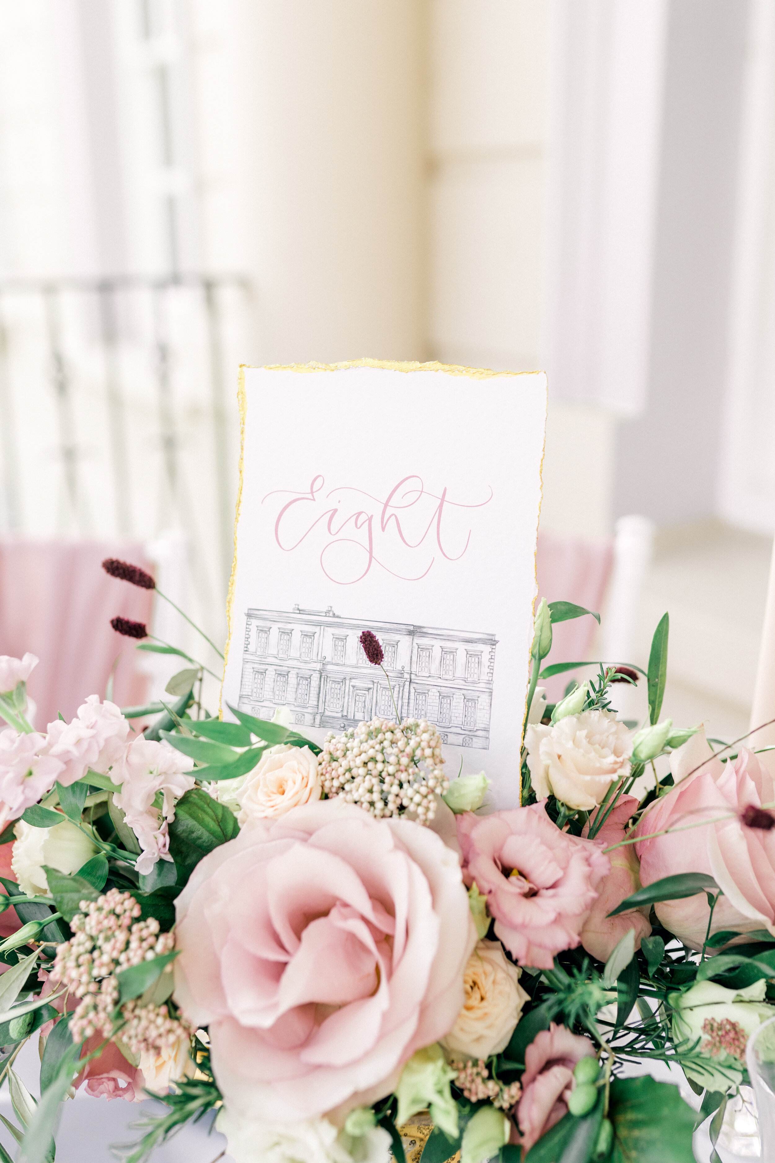 Buxted park table numbers with venue portrait and hand lettered calligraphy with blush pink and gold.jpg