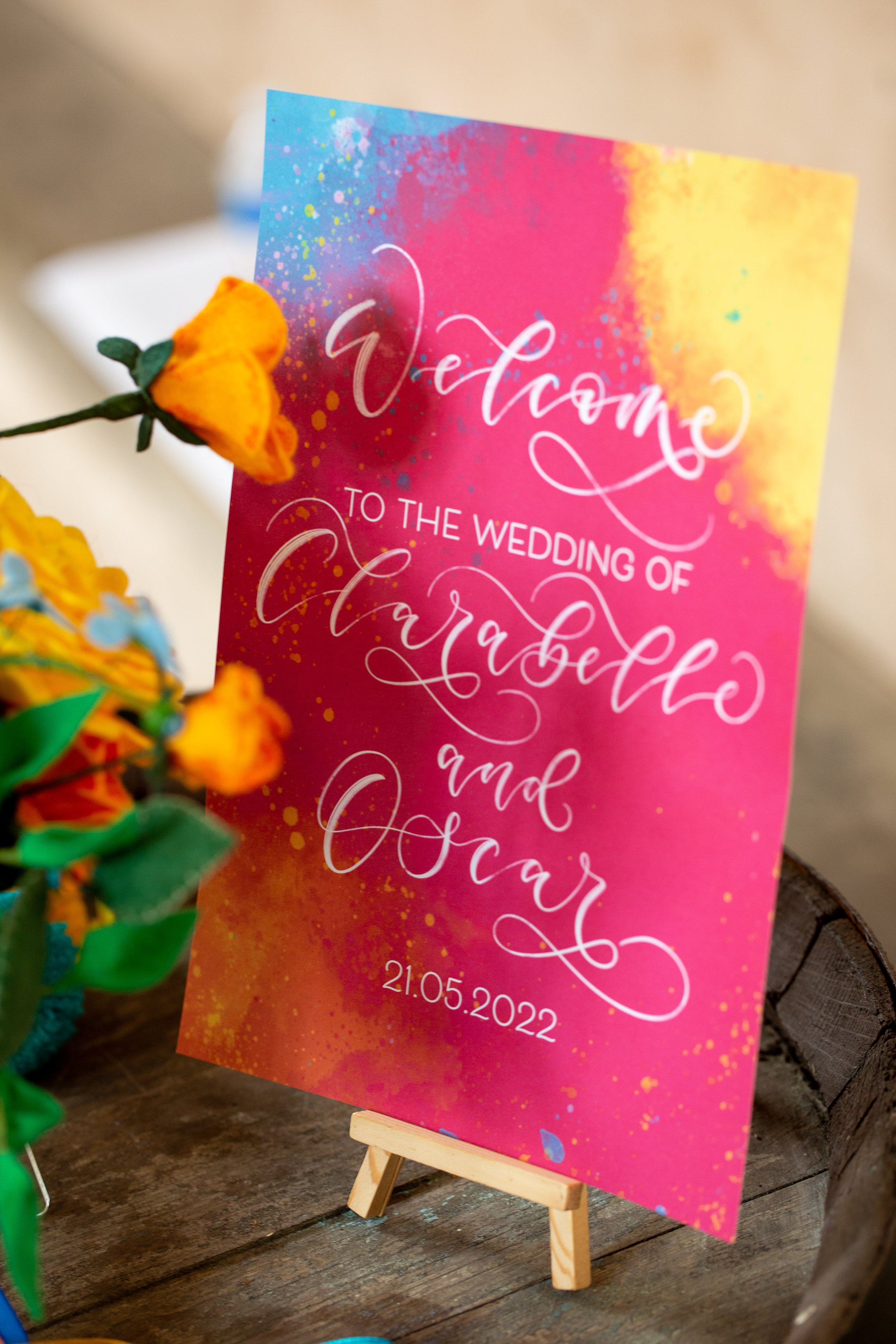 Festival wedding stationery watercolour wedding stationery with hot pink orange and blue, calligraphy welcome sign.jpg