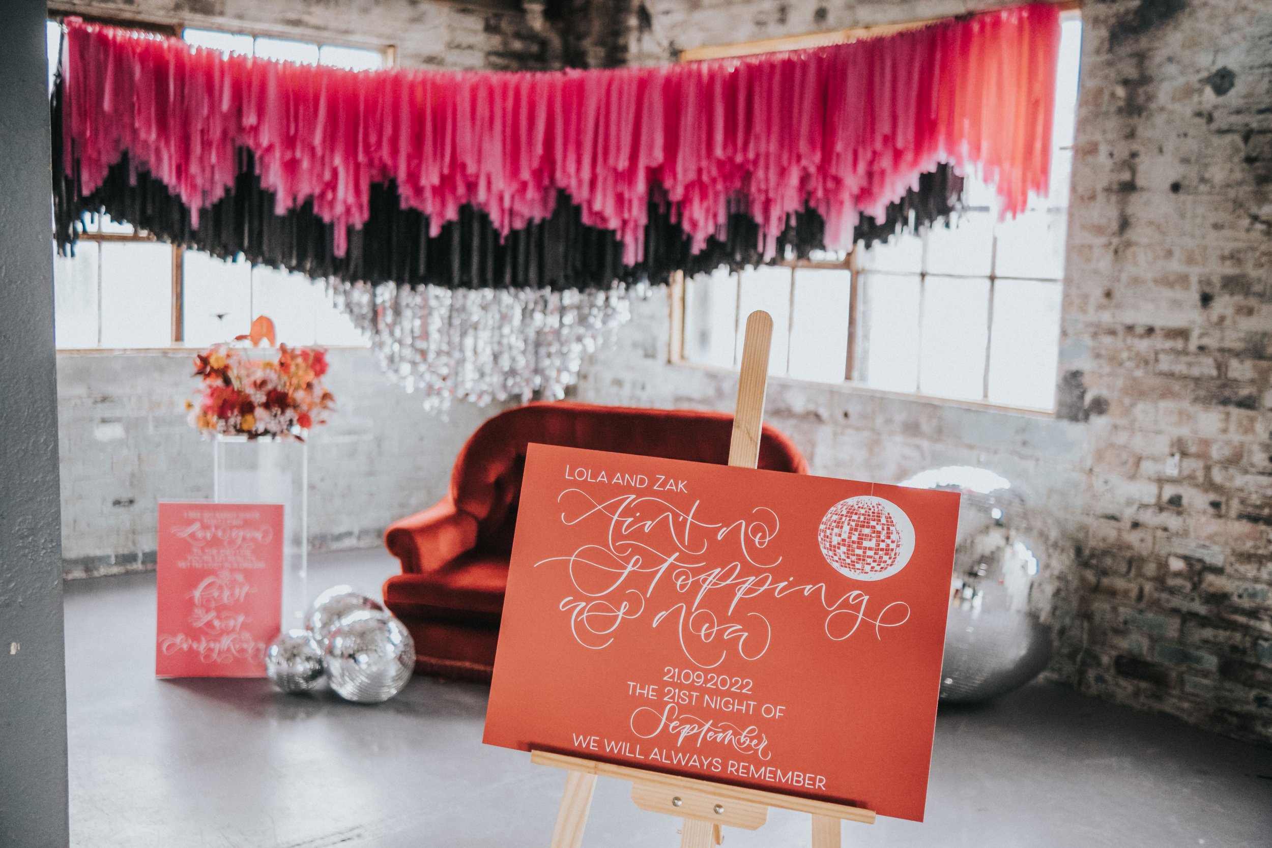 Disco themed wedding stationery with pink, black, grey and red colour scheme - disco ball wedding - calligraphy wedding signage and welcome signs.jpg