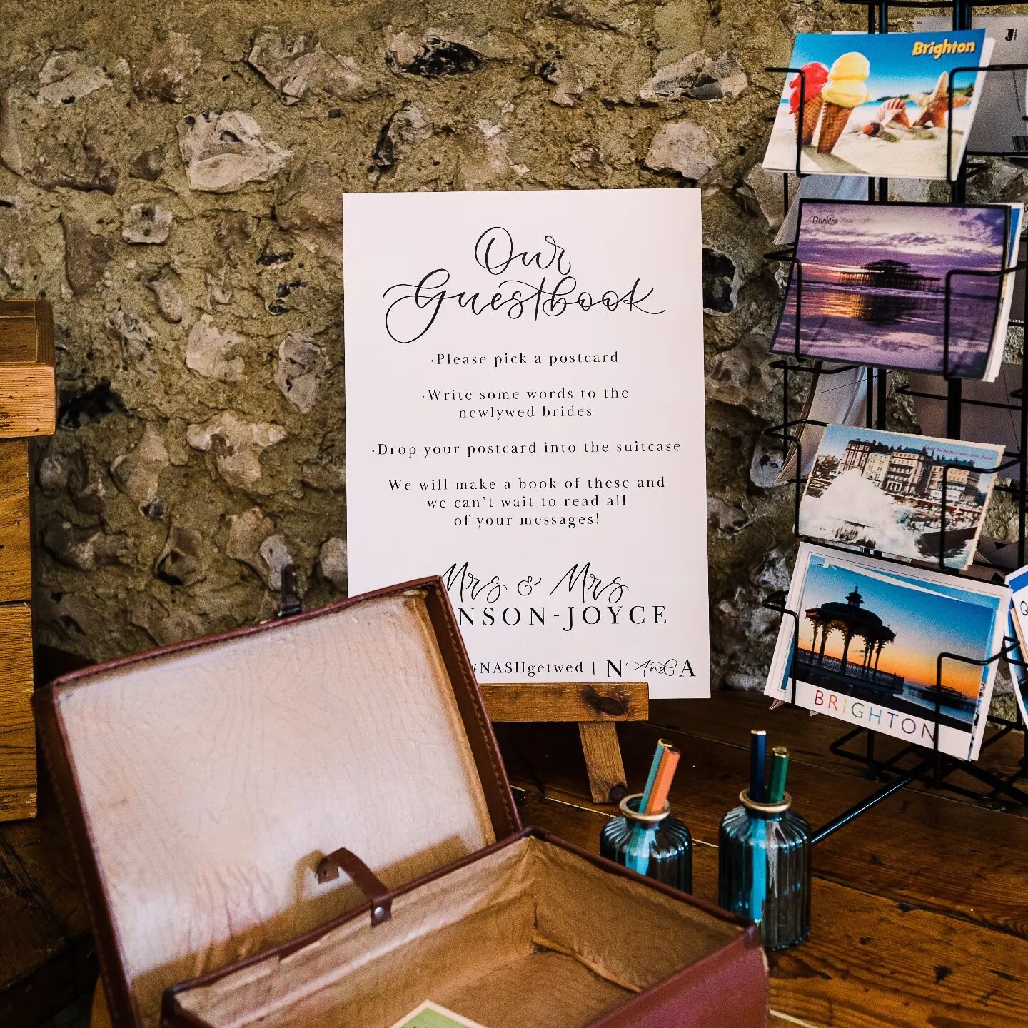 Guest book idea 📖 
Nat and Ash wanted something a bit different for their guest book. Running with their Brighton themed stationery, they provided their guests with a collection of postcards for them to write a message which they would put in a vint