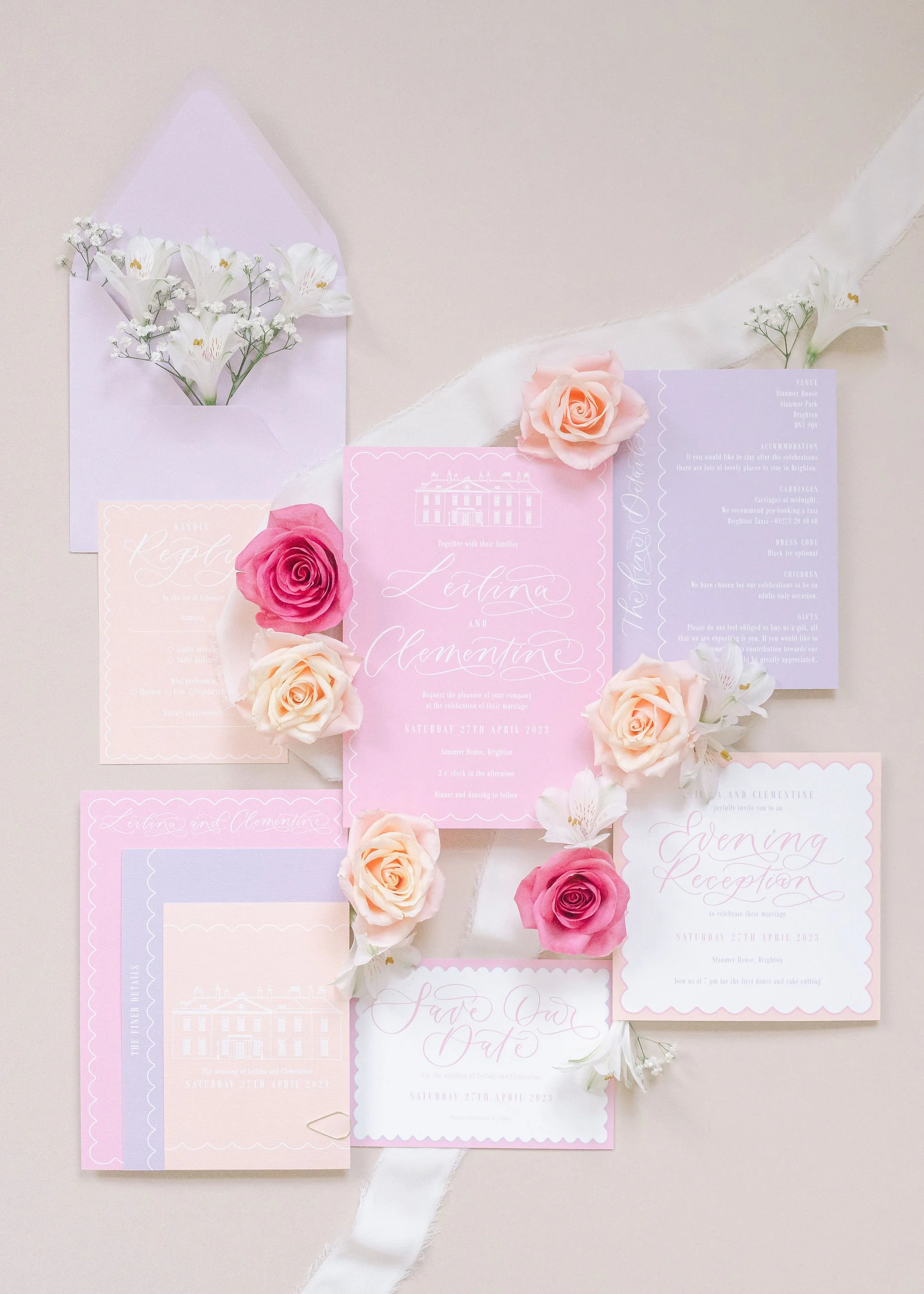 layered invitation set with gold clip - pastel pink, lilac and peach invitation with venue illustration, calligraphy and scalloped detail