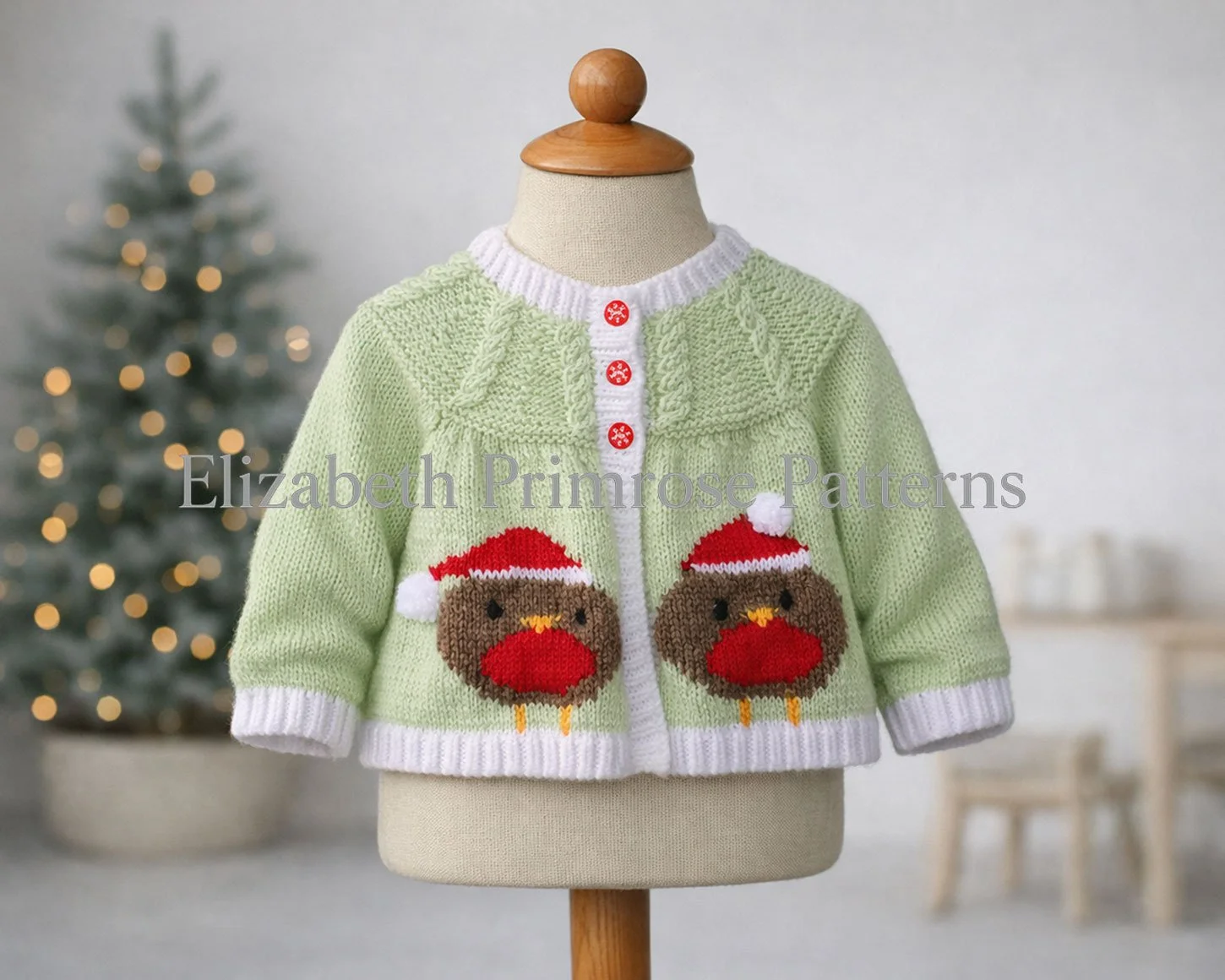 Knitted Christmas robin jacket displayed on a child’s mannequin with relaxed sleeves, crisp stitches, and a softly lit minimalist festive background.