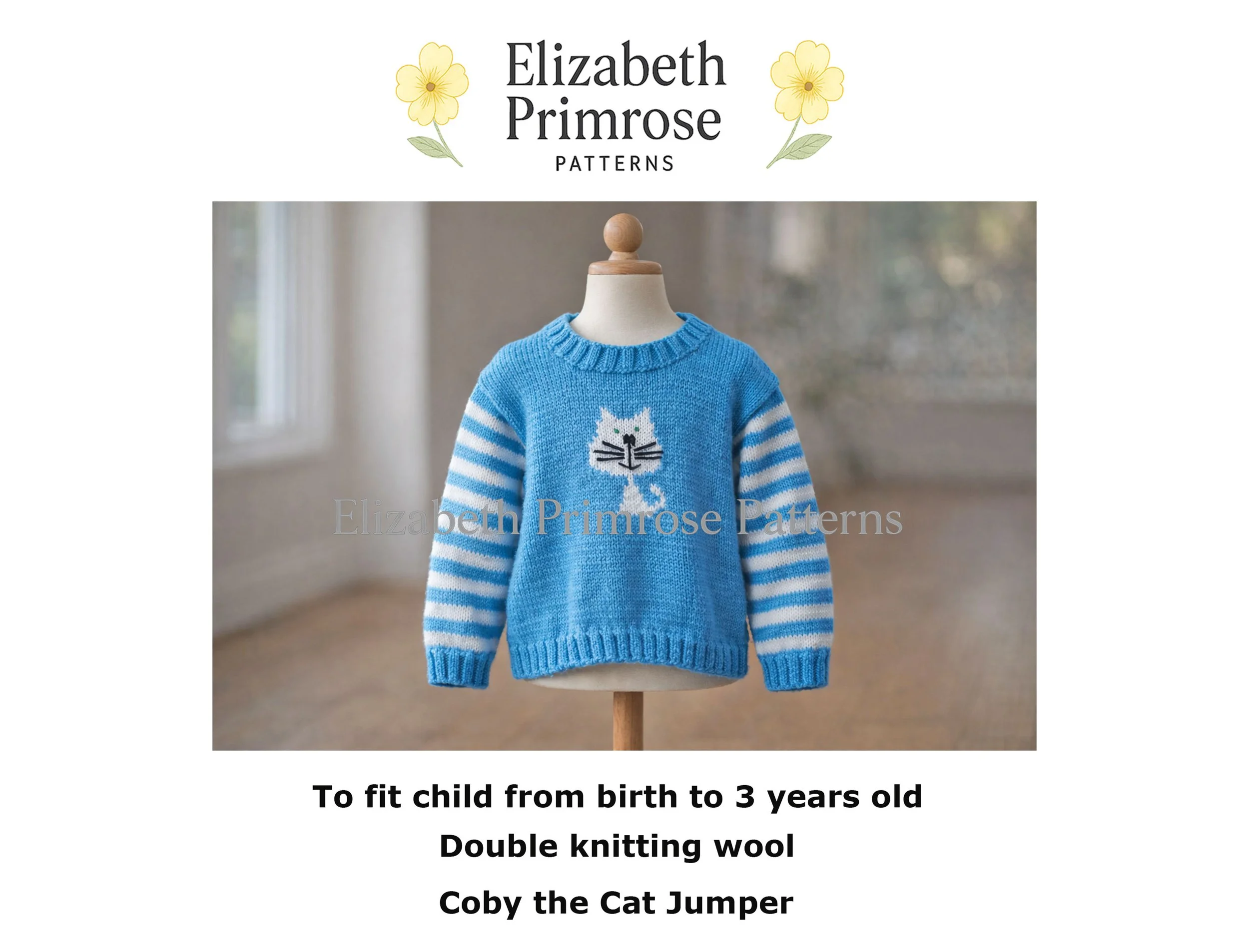 Blue toddler jumper with white cat motif and striped sleeves displayed on a wooden mannequin in soft indoor lighting.