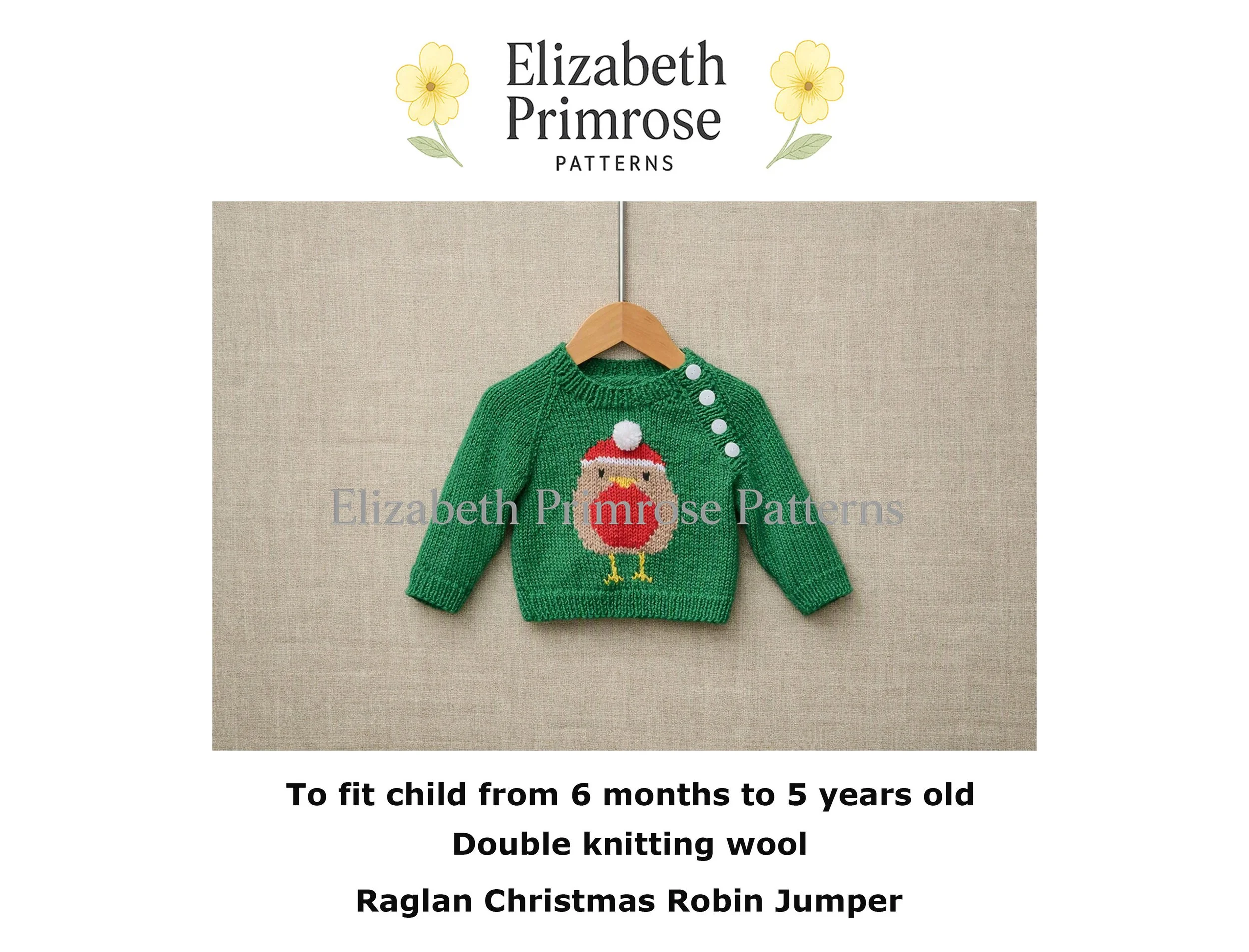 Blue green jumper with Christmas robin motif hanging on a wooden hanger against a neutral fabric background.