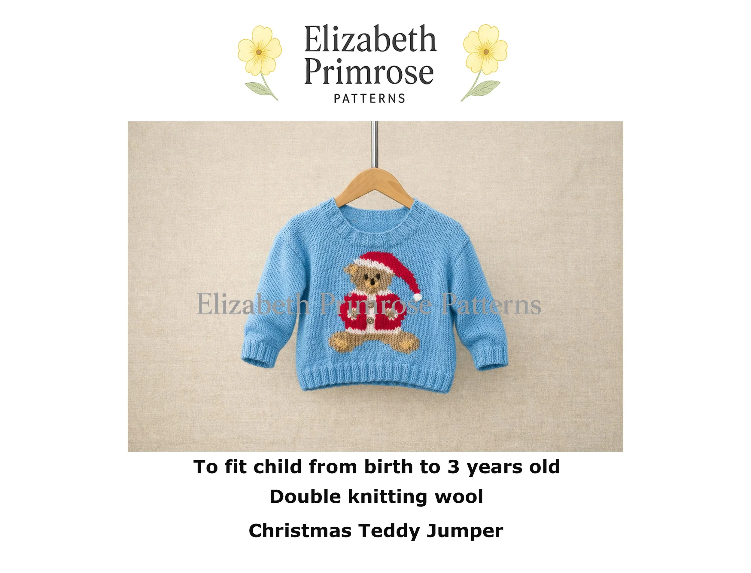 Blue knitted children’s jumper on a wooden hanger, featuring a festive teddy bear in a red Santa outfit, displayed against a soft beige linen background.