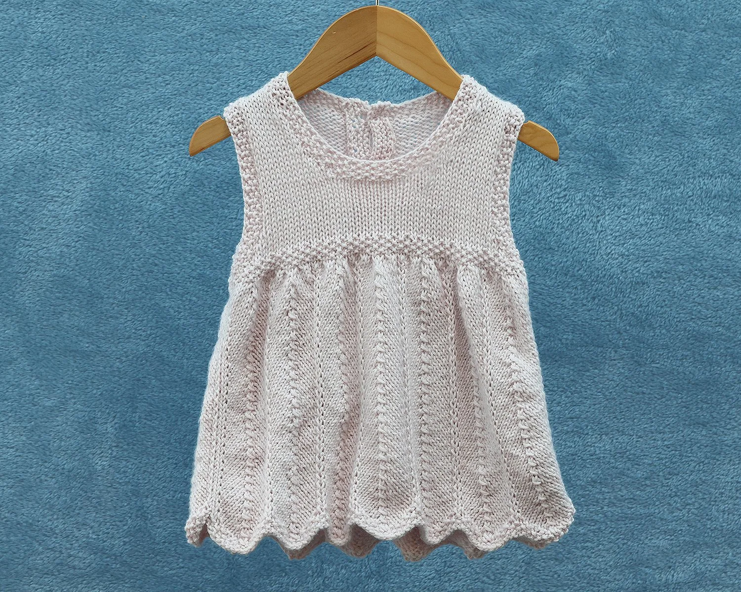 P185 Sleeveless Baby Dress Knitting Pattern.jpg