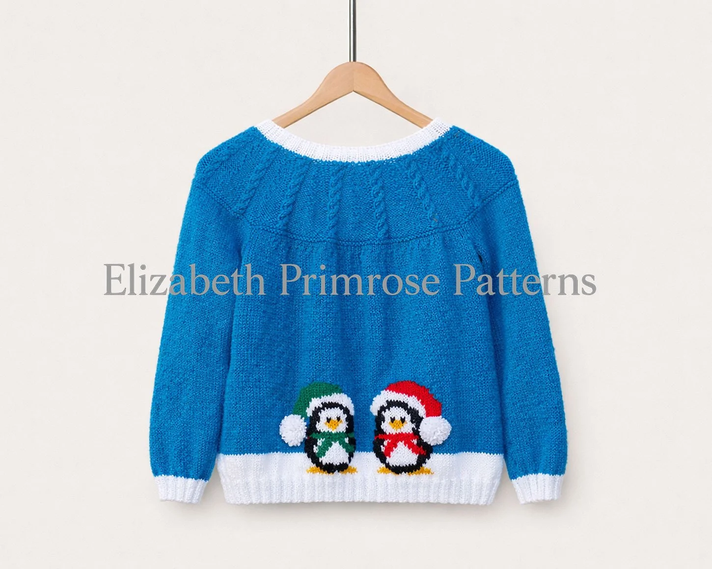Back view of a blue knitted cardigan with white edging, hanging neatly on a wooden hanger against a soft, uncluttered backdrop.
