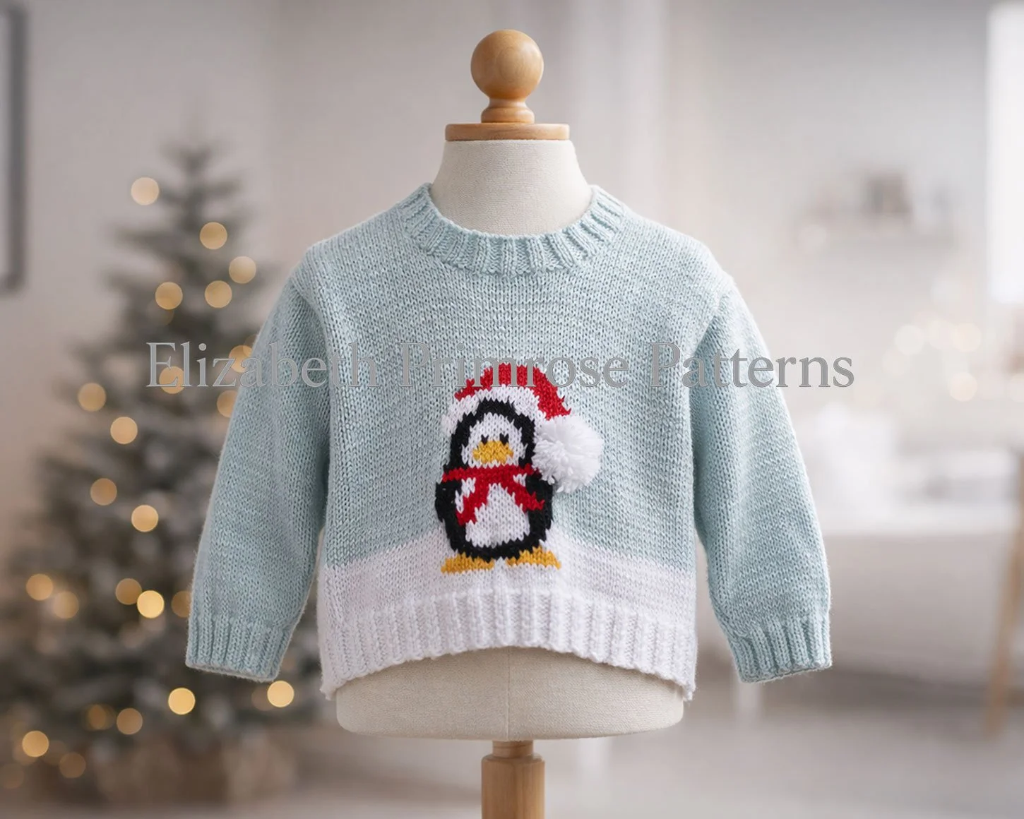 Knitted Christmas jumper featuring a penguin motif on a child mannequin with blurred festive background and warm side lighting.