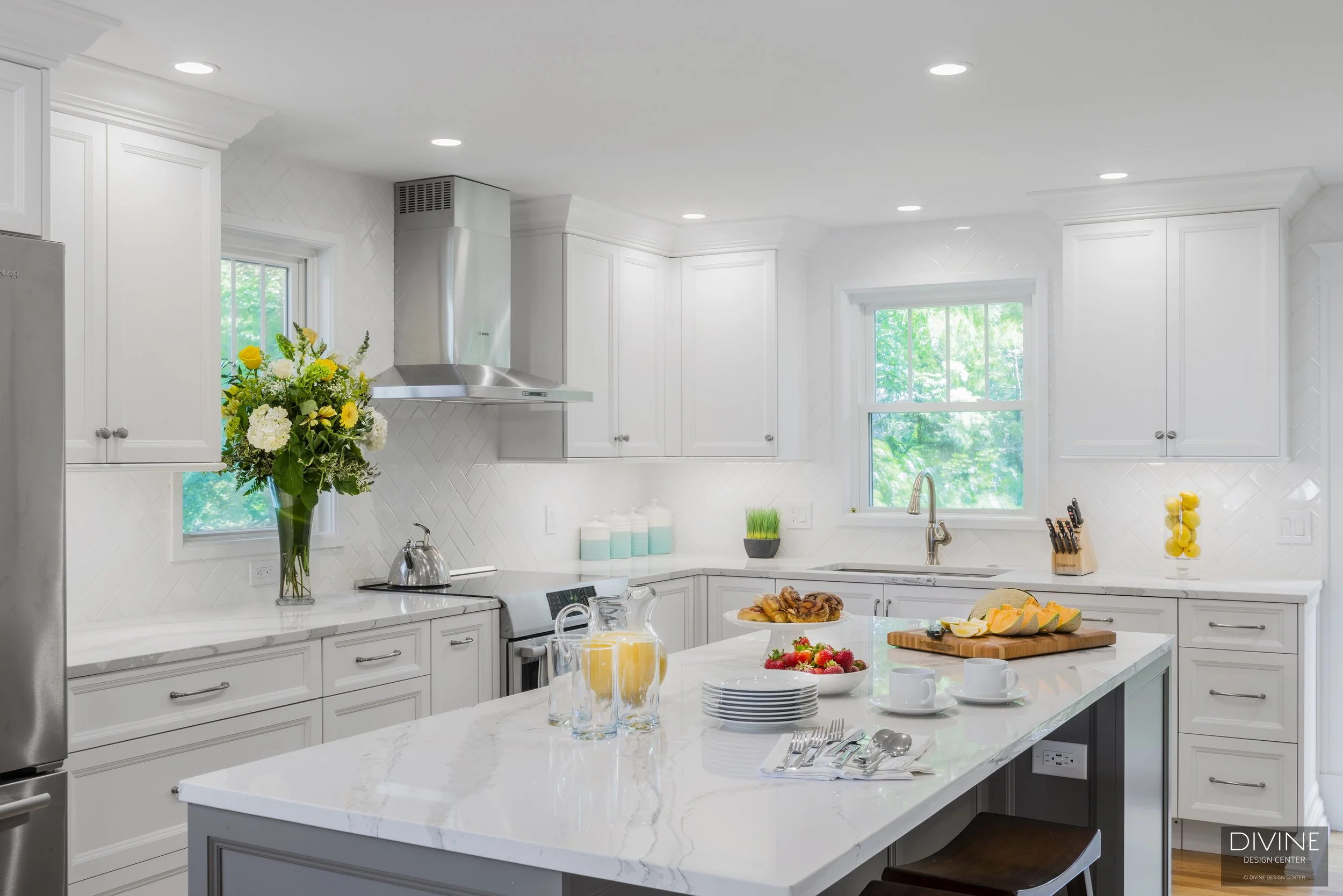 11. divine-design-center-Boston Light and Bright Transitional Kitchen Grey Island.jpg