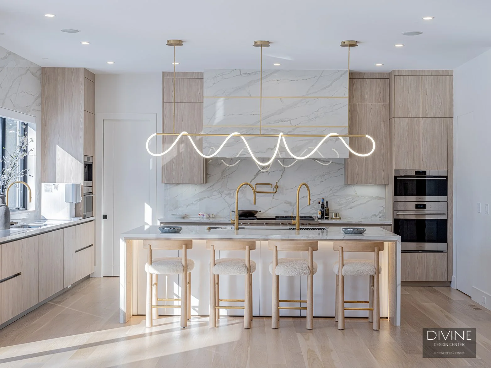 Sculptural Serenity: Dual-Faucet Marble Kitchen in Newton