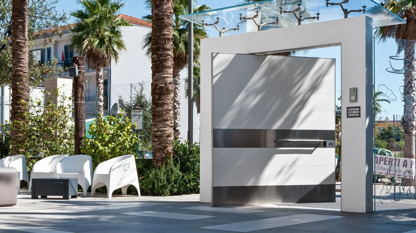 Grand entrances require grand solutions. 🏛️

The Synua pivoting safety door offers a level of customization that is unheard of in the industry. Whether you want it covered in natural stone, polished glass, laminate, or even specialized internal wood
