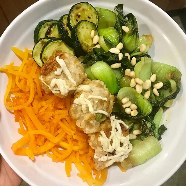 turkey meatballs (ground turkey + gf bread crumbs + tamari + green onions), zucchini, bok choy, and butternut squash noodles (from @wholefoods) topped w/ @daiyafoods non dairy mozzarella cheese &amp; pine nuts! looking forward to a weekend of getting