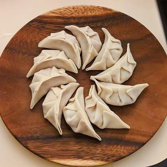 celebrated lunar new year with some dumplings on tuesday! Unfortunately the pre-made wrappers are full of gluten &amp; my attempt at homemade wrappers was definitively unsuccessful, so I ended up just eating dumpling filling patties. Pictured are the