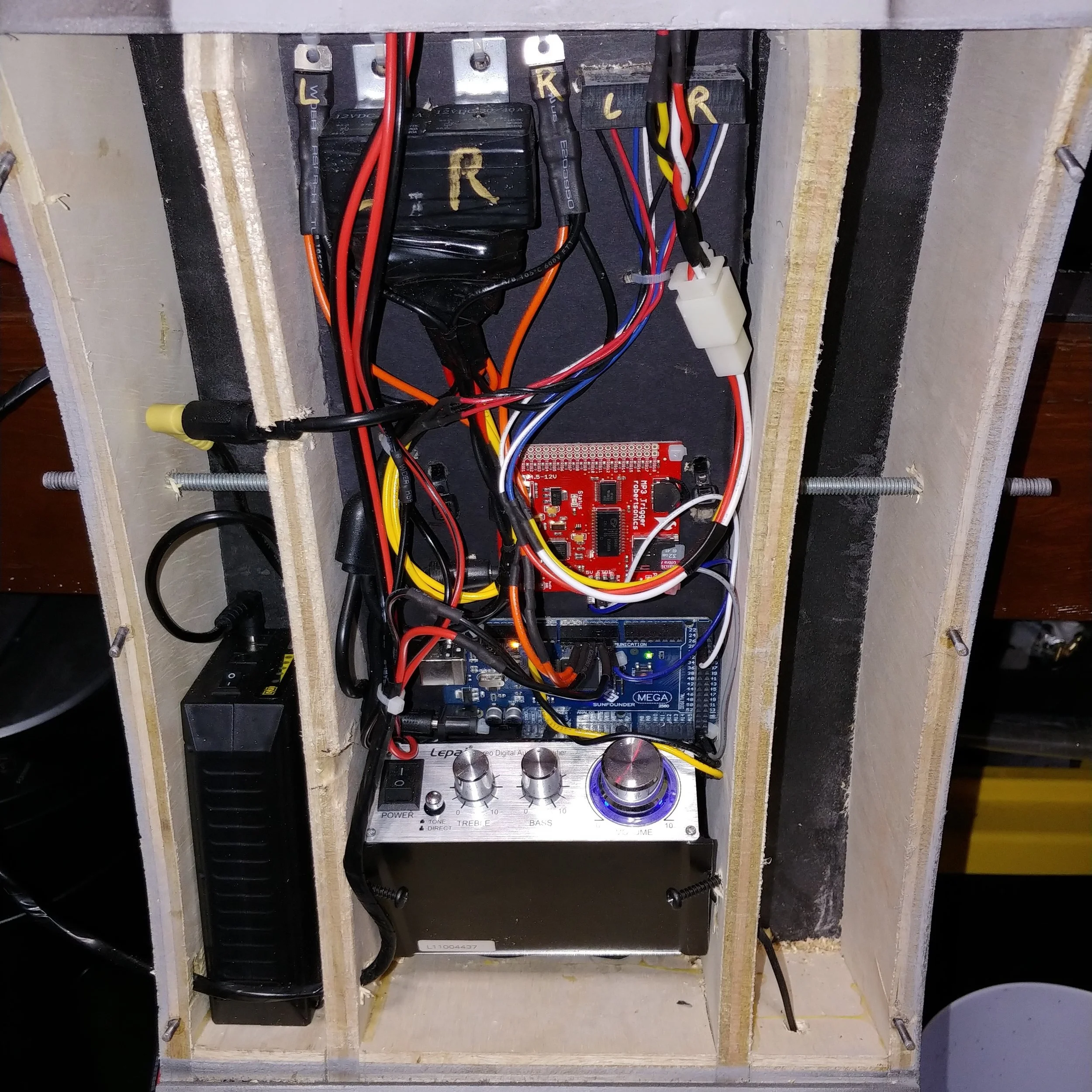 The electronics for Liv’s Droideka allowed her to play theme music and fire her blasters(LED lights in each blaster along with synced sound effects) via two arcade buttons.