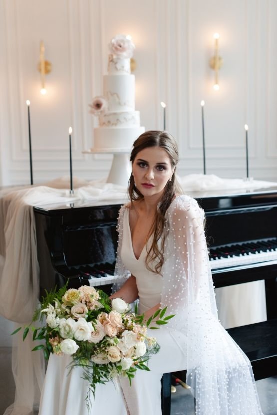 Loving the pearl wedding trend_ You must see this stunning bridal cape!.jpg