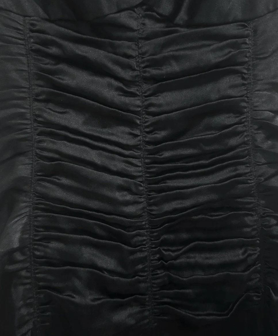 Silk Elie Tahari cocktail dress with ruched bodice and delicate strap halter. 

The skirt falls above the knee and the dress zips at the side bust. 

US 2 | $60