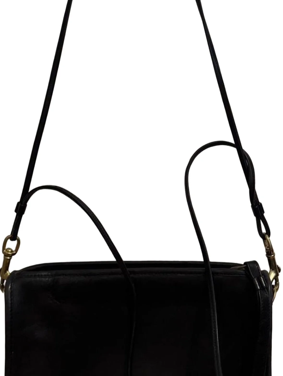 Black leather COACH bag with detachable skinny doubled strap and zip closure. 

Slim sillouette much like a clutch bag, and has an inner pocket. 

SOLD