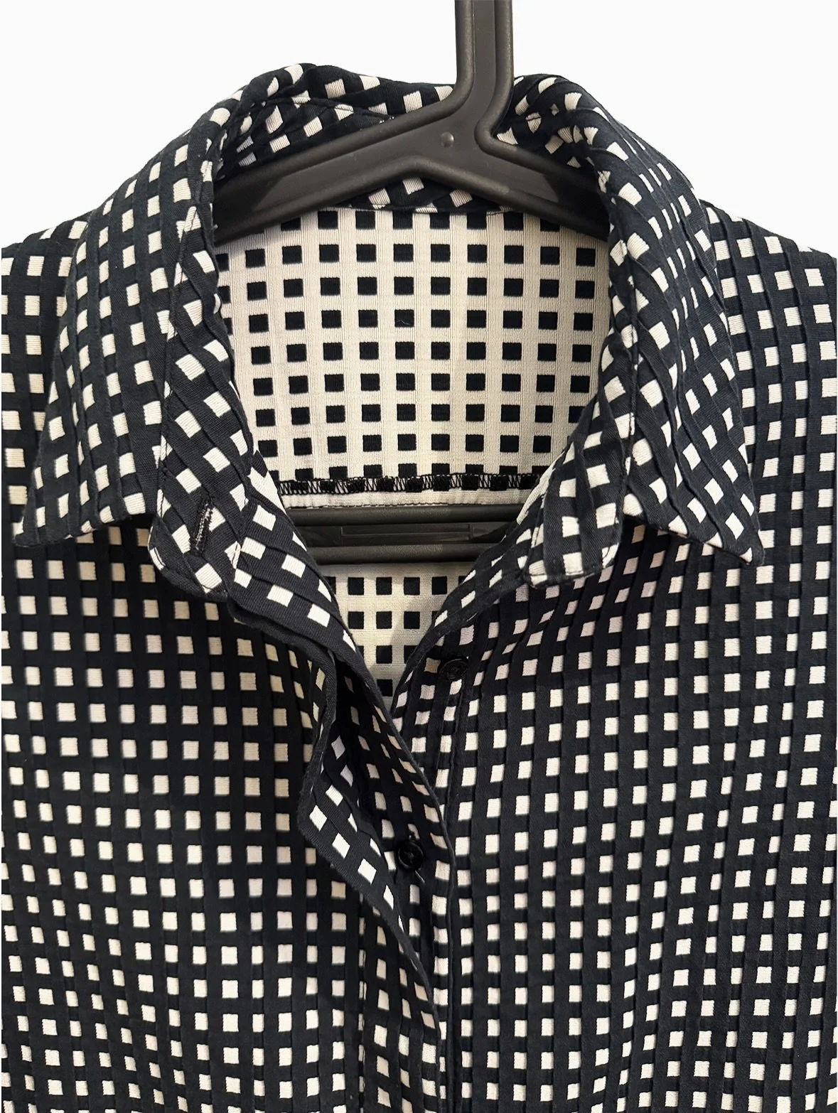 Textured grid button up top

A bit of an A-line shape with concealed button placket

US 4 | $40