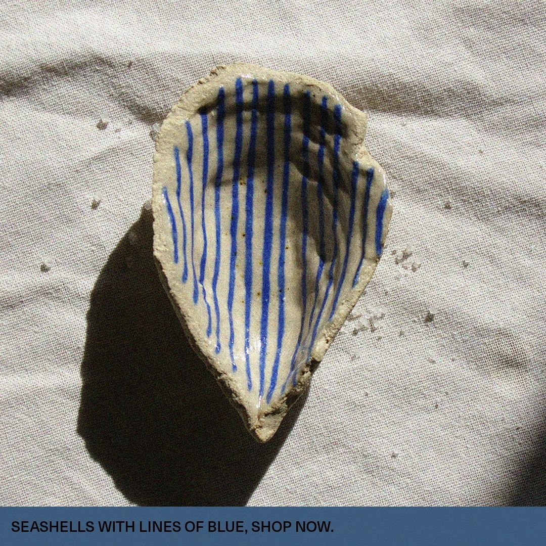 Ceramic seashells with lines of blue 💙💙💙