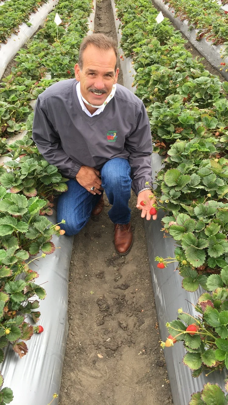 Rob Holding a strwberries.jpg