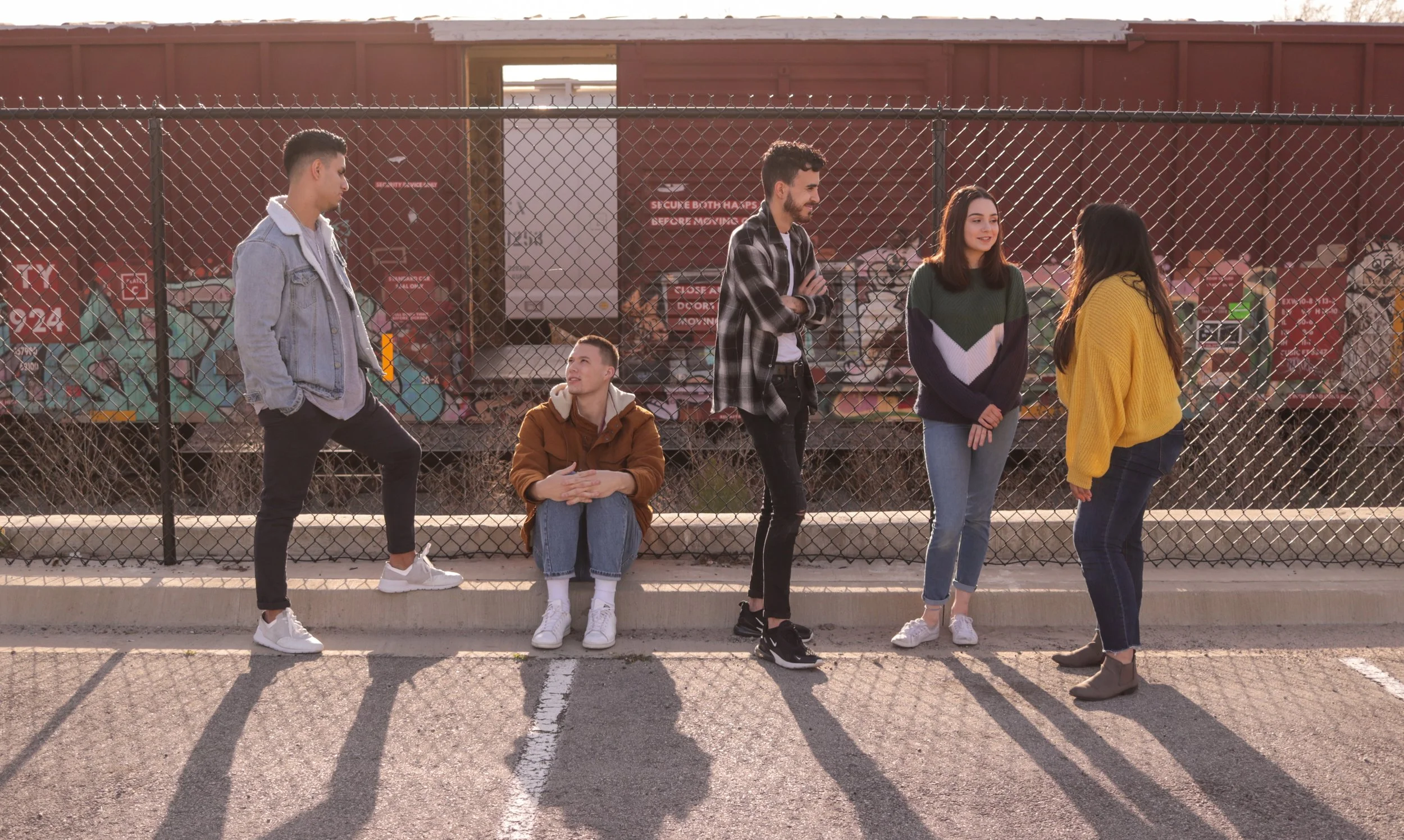 teens by fence.jpg