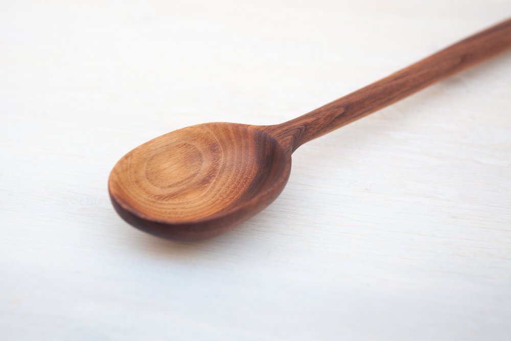 wooden spoon with dried jasmine flowers close up Stock Photo by vvoennyy