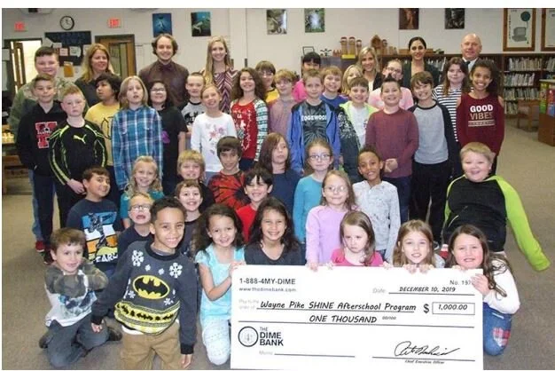 The Dime Bank Contributes to SHINE After-school Program