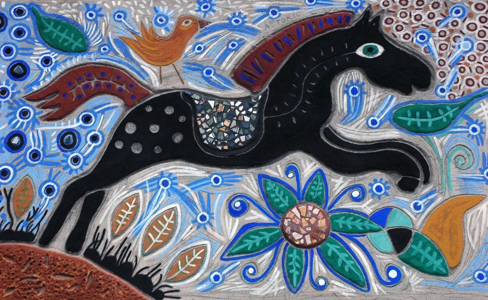 This mural was dedicated to this black horse, Toric. He was very loved by all of us.