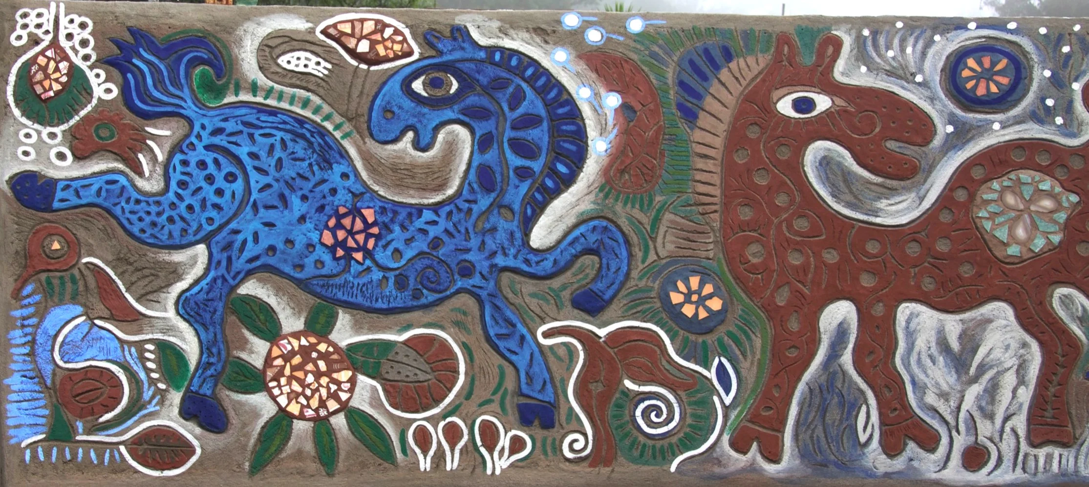 The blue and the red are the first horses.