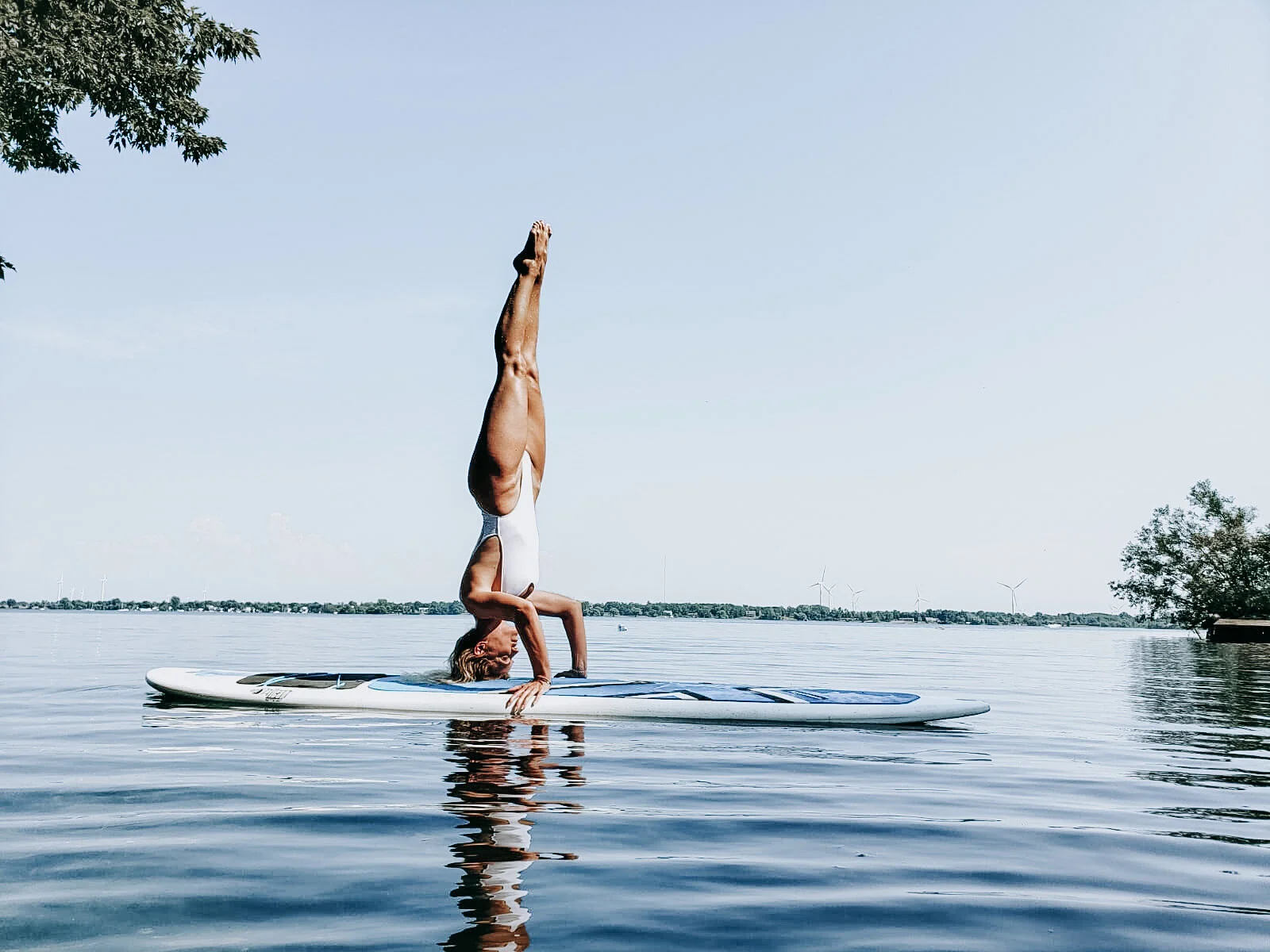 How to handstand on a paddle board