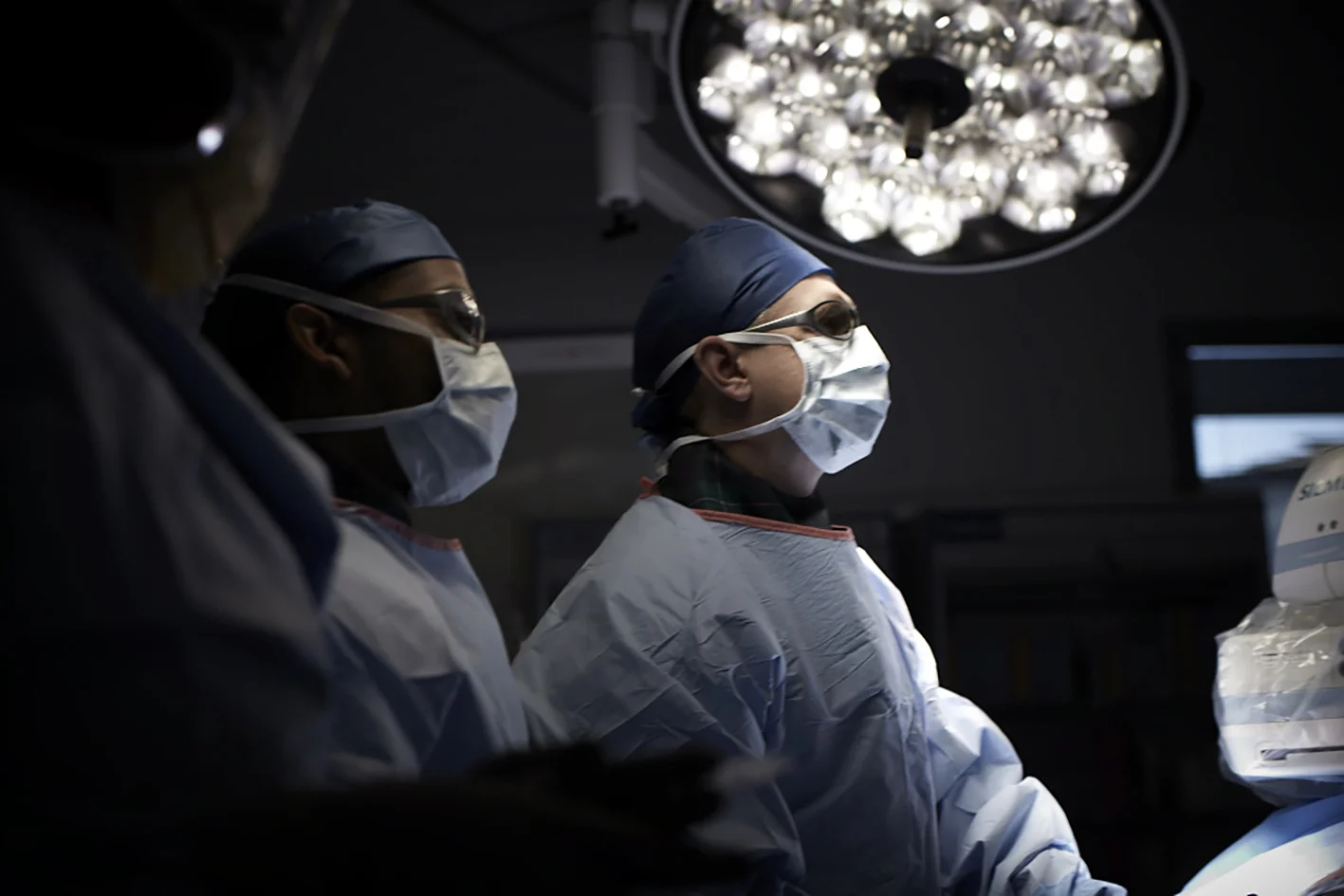Vascular Associates surgeons in surgical theatre.